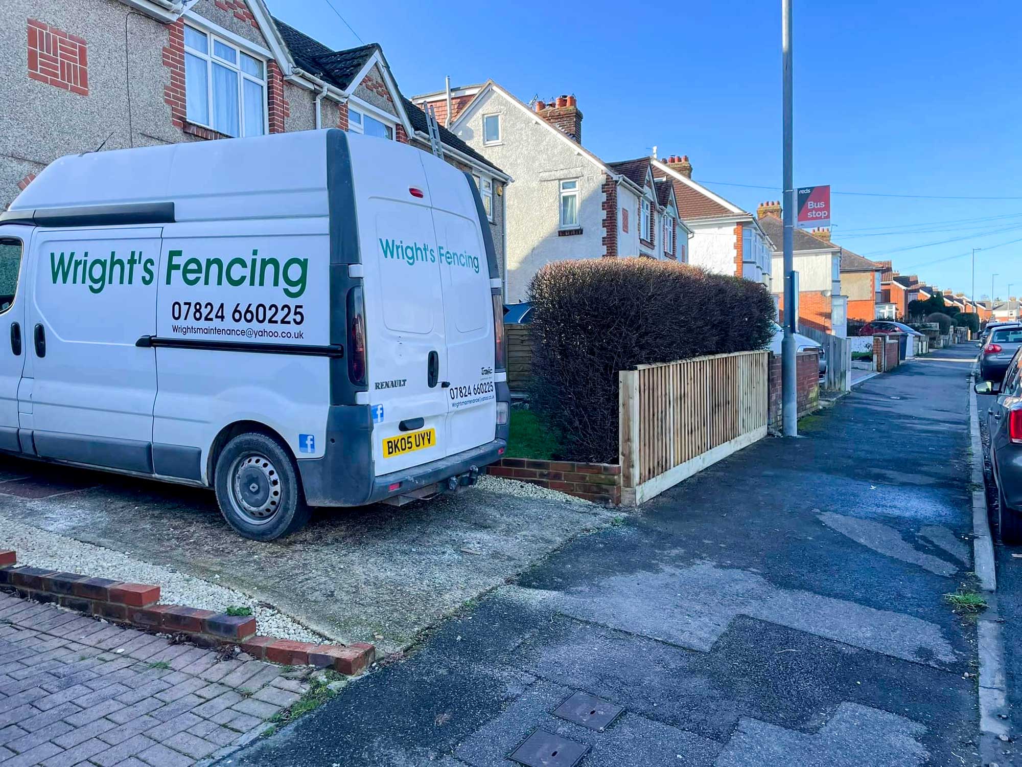 Wright's fencing van parked in drive.